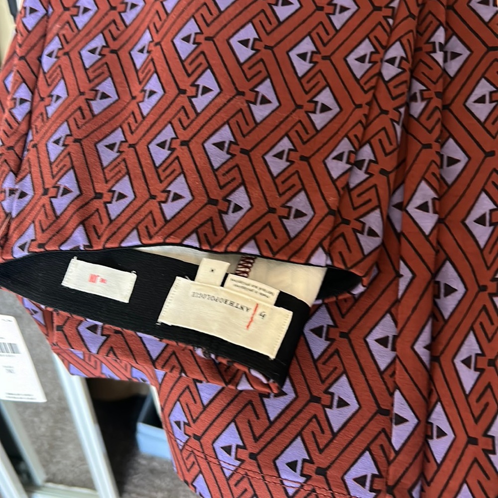 new Anthropologie pants in medium that almost new coat